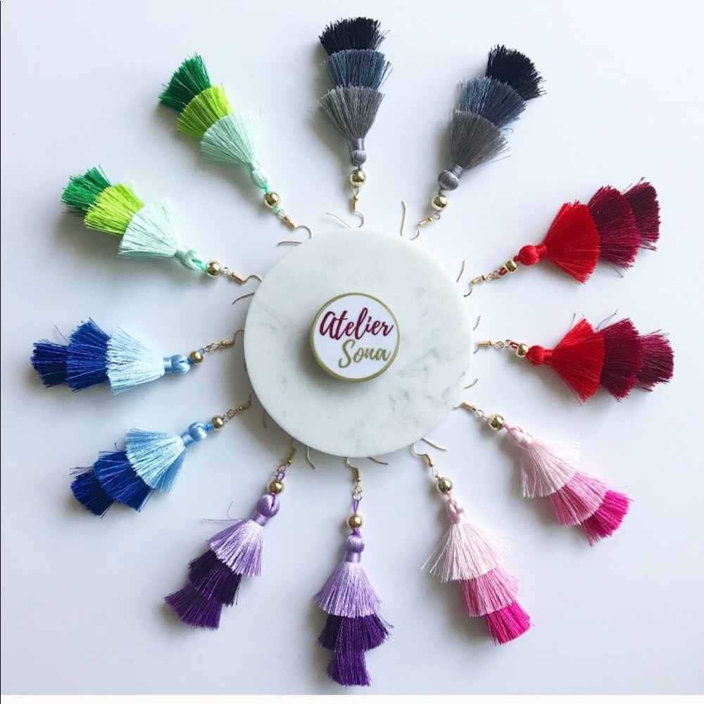 Multi tiered tassel earrings